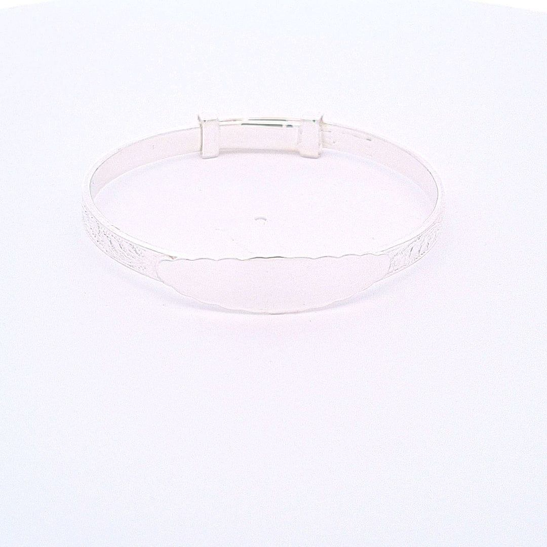 Sterling silver expanding engraved pattern ID Christening bangle 33706 - Armin Lowe Jewellers