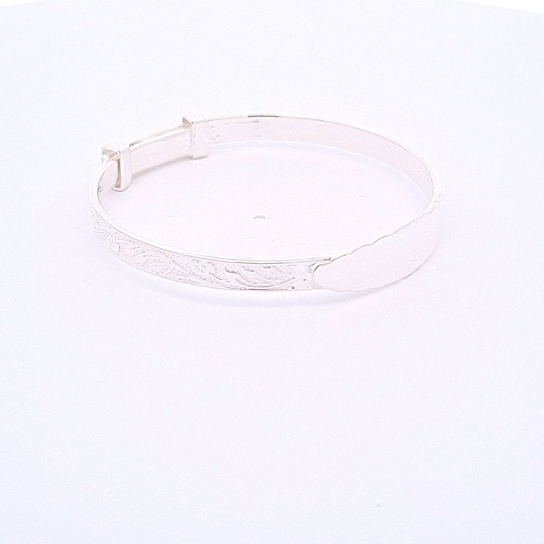 Sterling silver expanding engraved pattern ID Christening bangle 33706 - Armin Lowe Jewellers